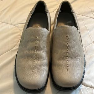 Hughes Flora slide on shoes.